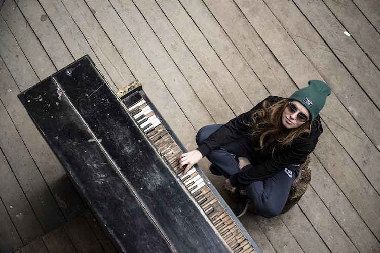 Pianist with sunglassed playing music photographed from top